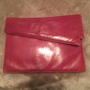 A staple red clutch (optional straps included)